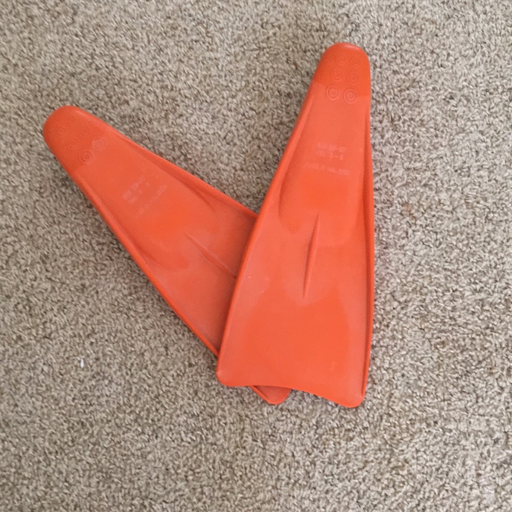 Orange swimming fins